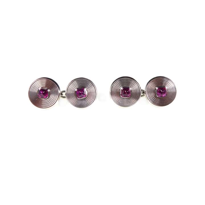 Pair of Art Deco platinum and sugarloaf ruby cufflinks by Cartier